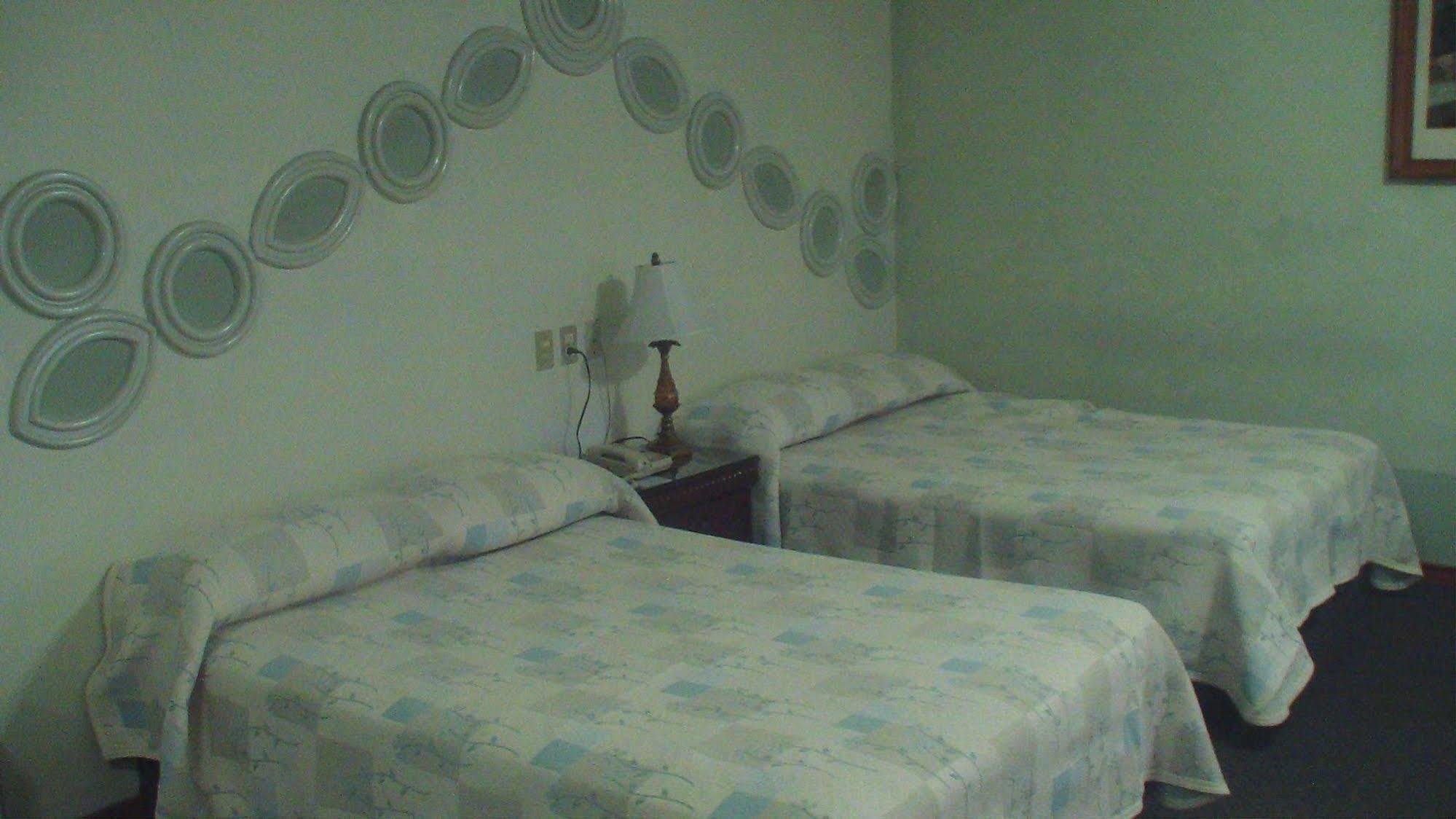 Hotel Gya Express อากวสคาเลียนเทส ภายนอก รูปภาพ