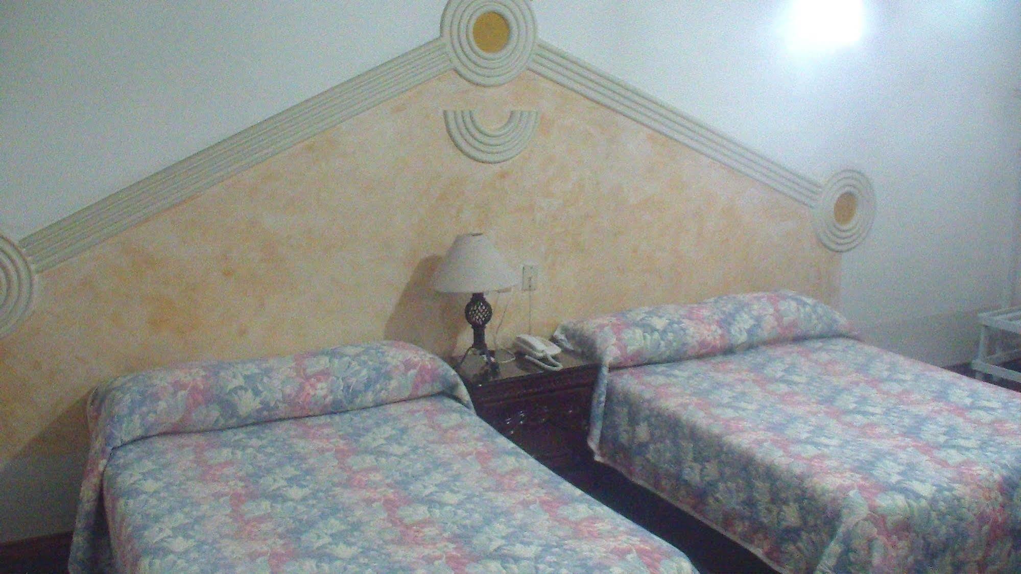 Hotel Gya Express อากวสคาเลียนเทส ภายนอก รูปภาพ