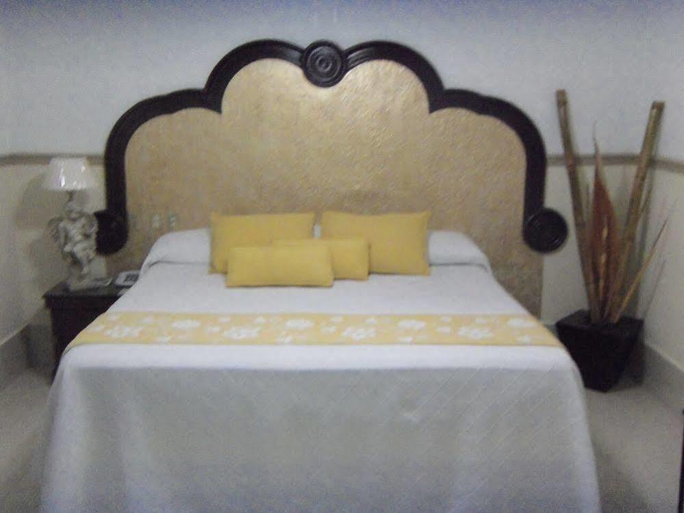 Hotel Gya Express อากวสคาเลียนเทส ภายนอก รูปภาพ